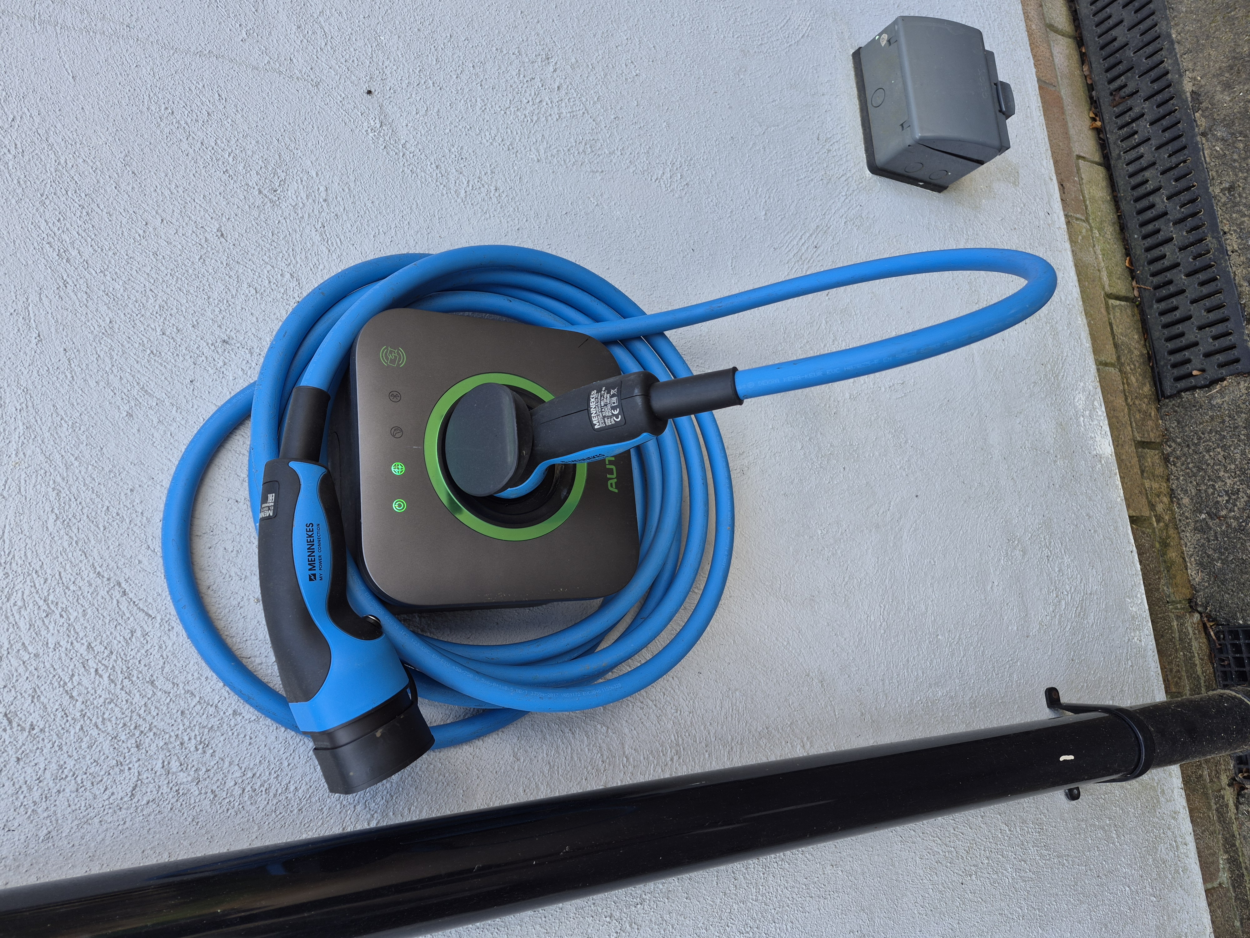 Close-up of the Autel 7.4kW EV charger with extra long cable
